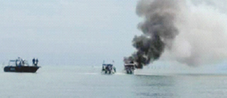 Boat with six Italian tourists catches fire